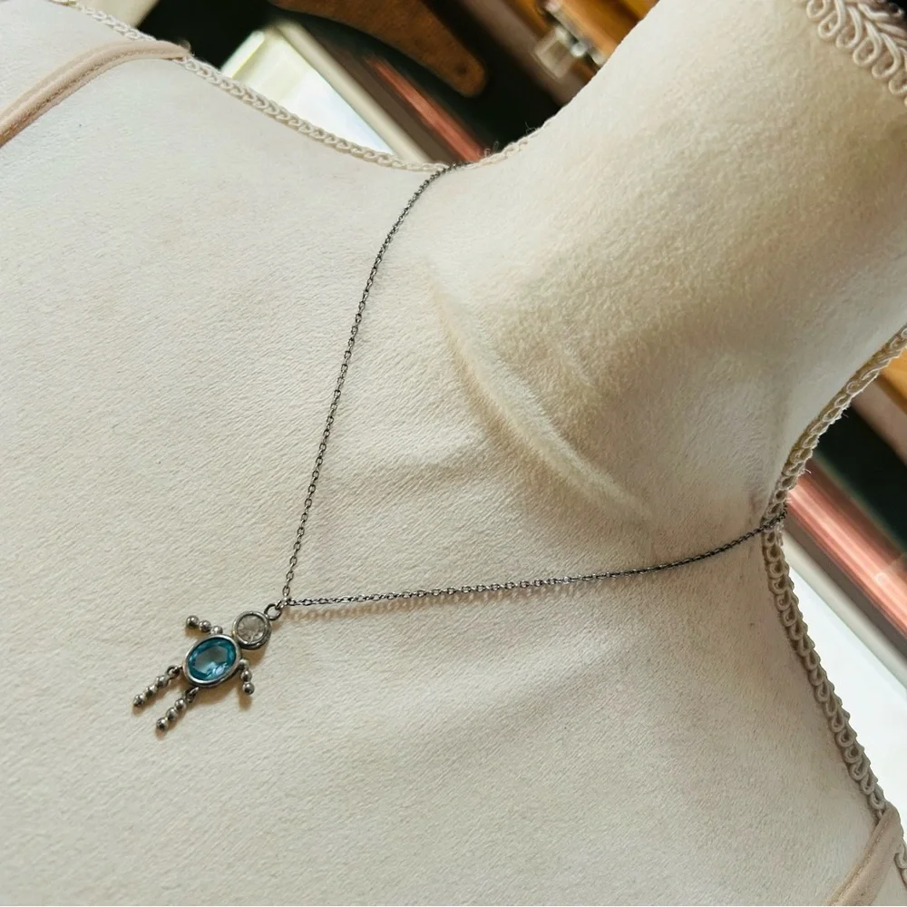 Vintage articulated leg crystal man pendant on chain necklace